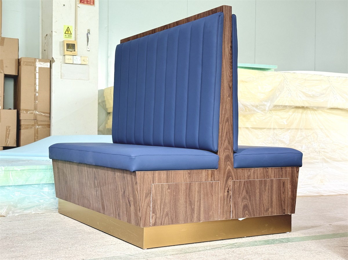 Modern blue faux leather booth seating with double-sided design and wood grain support for commercial spaces