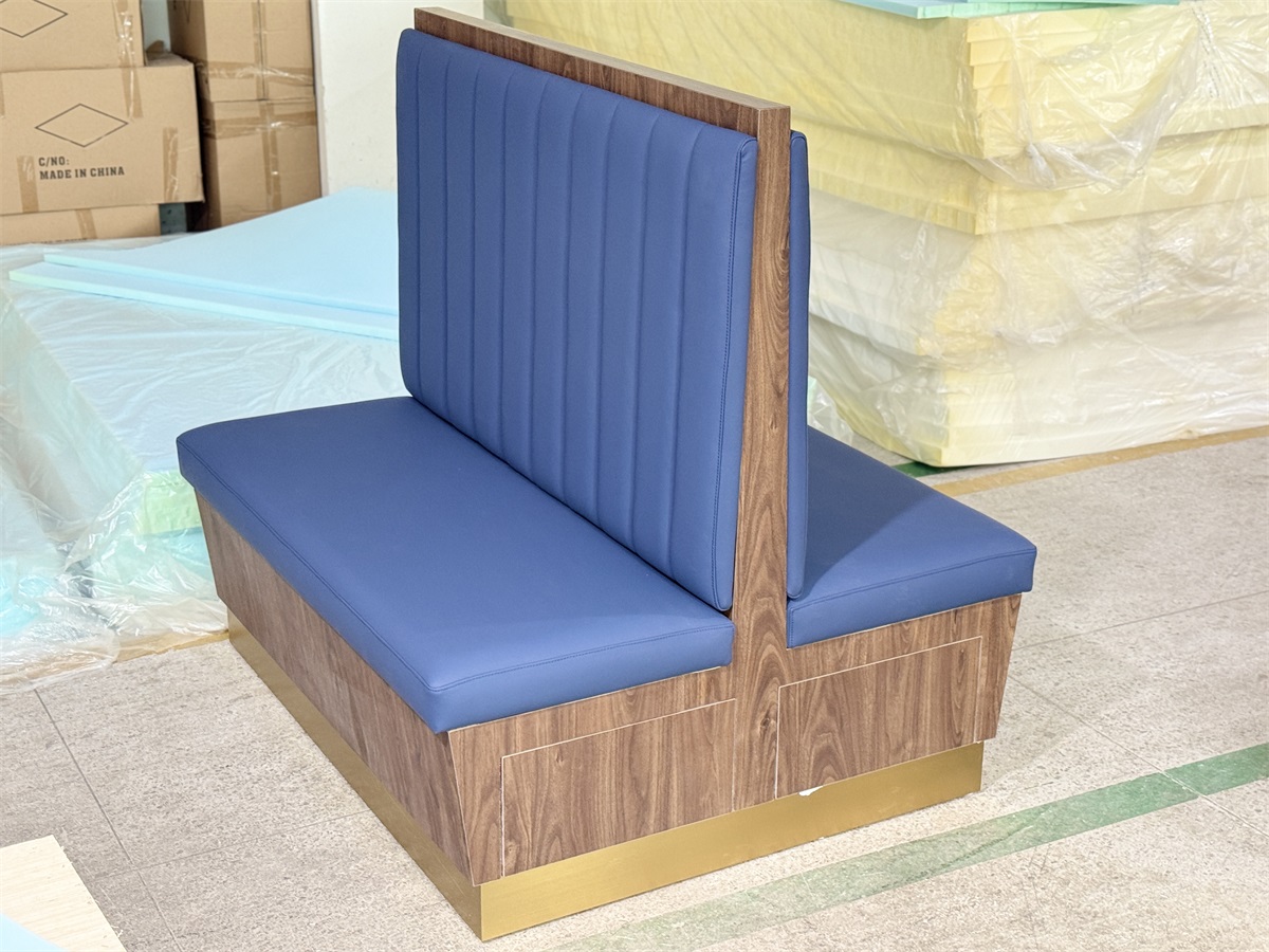 Blue upholstered double-sided seating for cafés and restaurants with a durable wood base