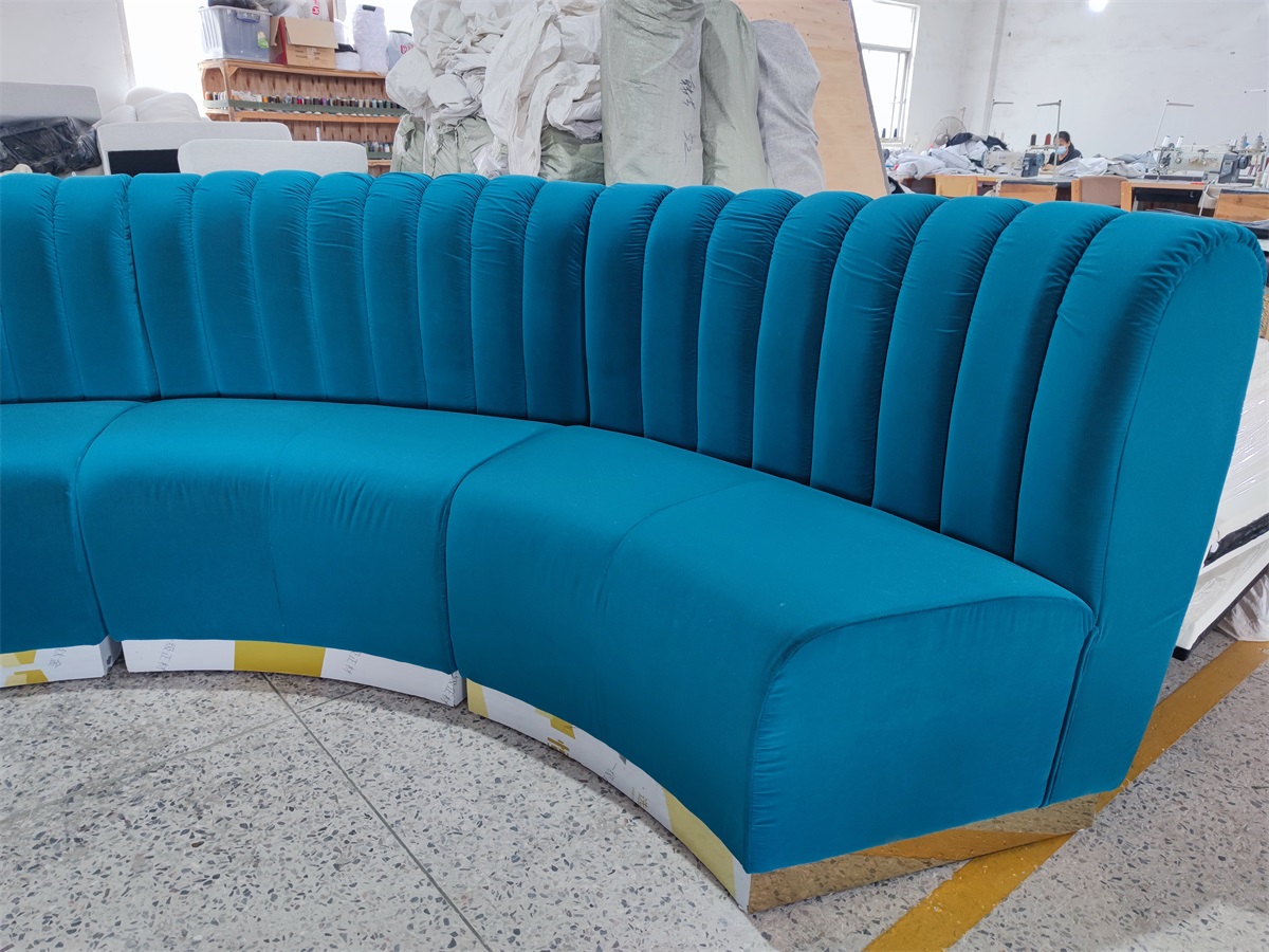 Modular curved booth seating designed for hotel lounge areas