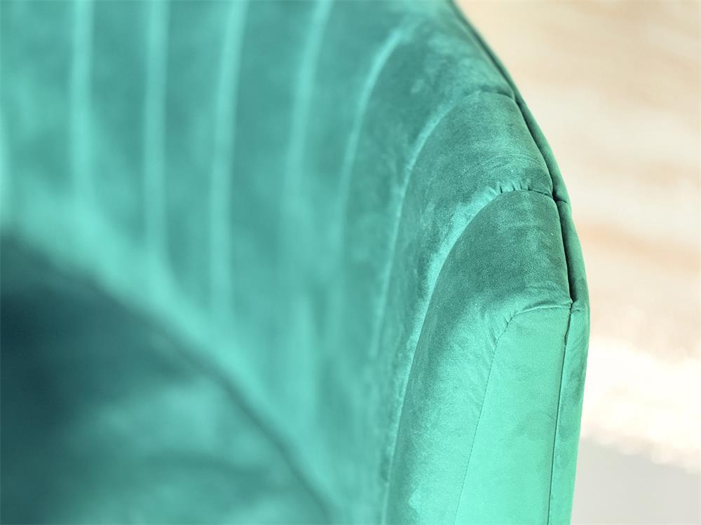 Commercial-grade semi-circular green upholstered booth with channel tufting