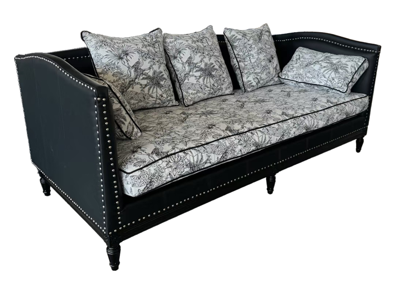 Black Tufted Leather Frame Sofa with Botanical Print Cushions | Vintage 3-Seater Couch for Hotel Lobby or Lounge
